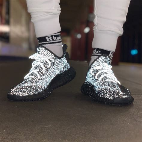 yeezy black reflective stockx.